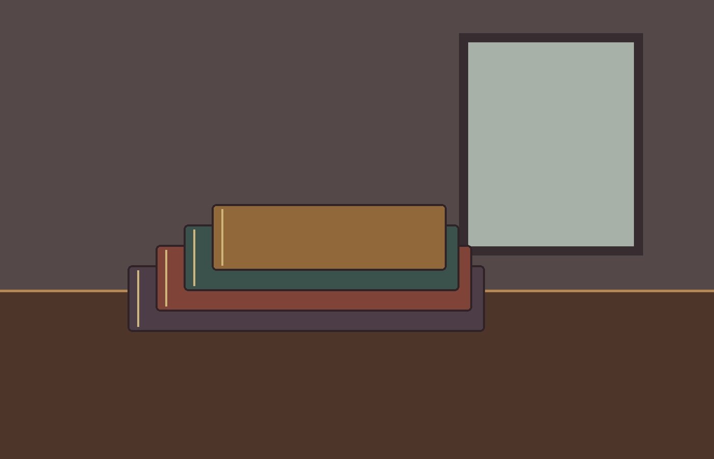 Several closed clothbound notebooks on a bare table beneath a high window