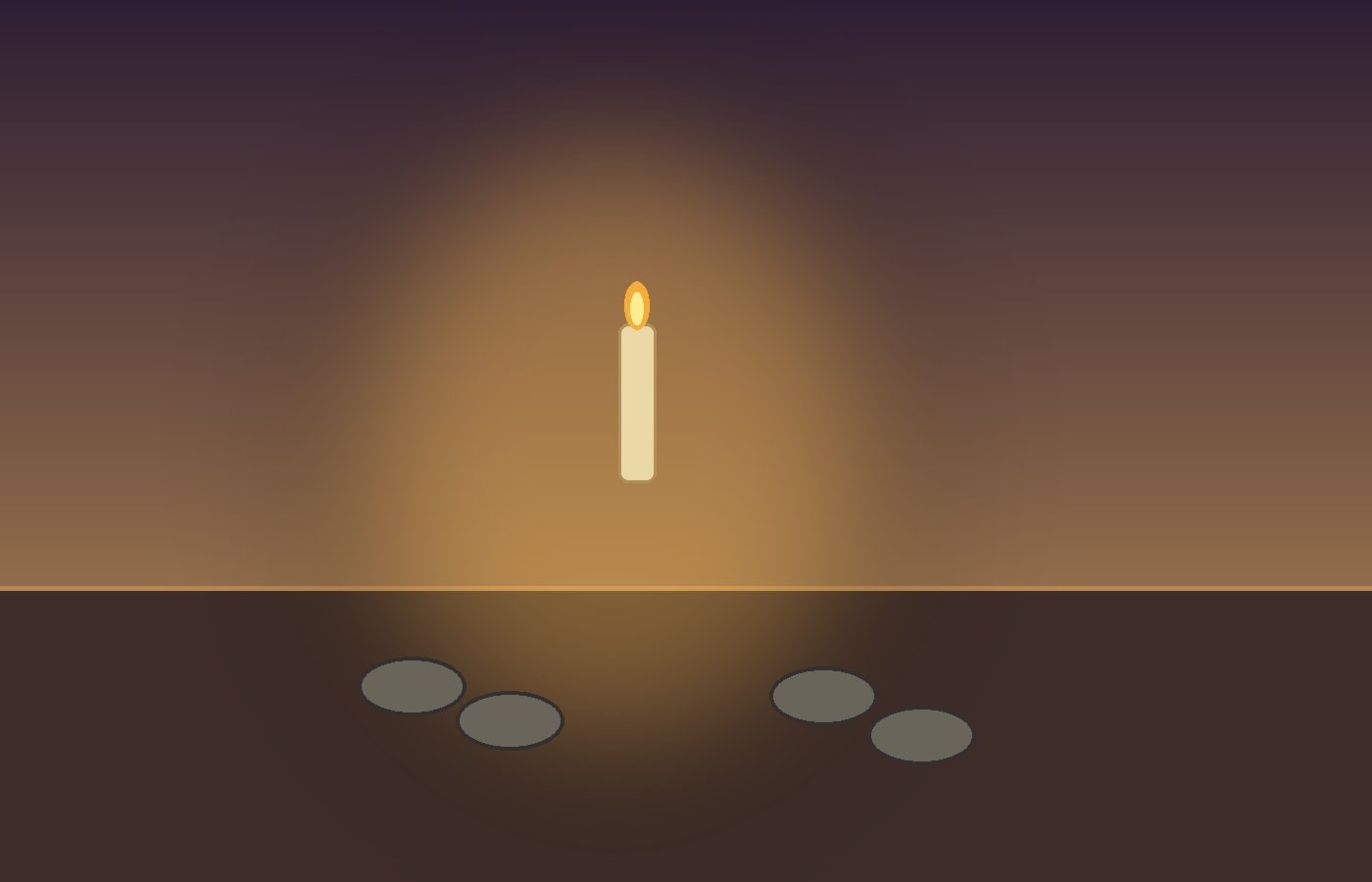A single candle beside smooth stones on a dark wooden table